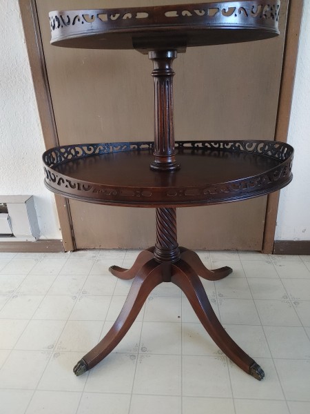 A two tier wooden table.