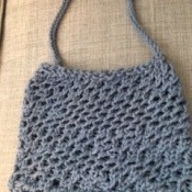 The completed loom knit bag.