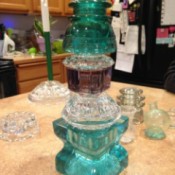 A glass tower made from thriftstore glass pieces.